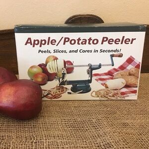 NWT Apple Potato peeler.  Peels, slices and cores in seconds.